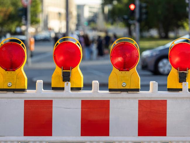 Warning lights at a construction site on the street