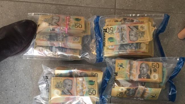 Drugs and cash seized during recent raid at Coomera.