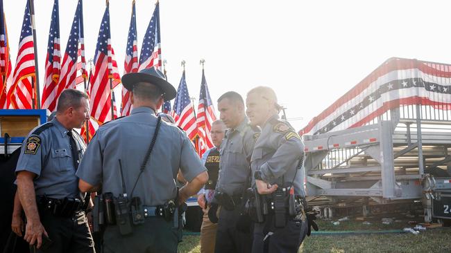 Law enforcement officers looked over the scene of a shooting at a rally for former President Donald Trump last Saturday. Picture: Anna Moneymaker / Getty Images via AFP