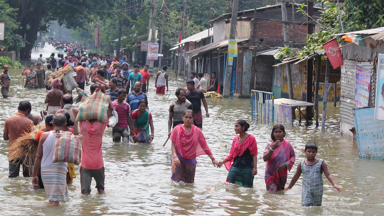 Floods in Bangladesh, for instance, could worsen as sea levels rise further displacing people. AFP PHOTO / STR