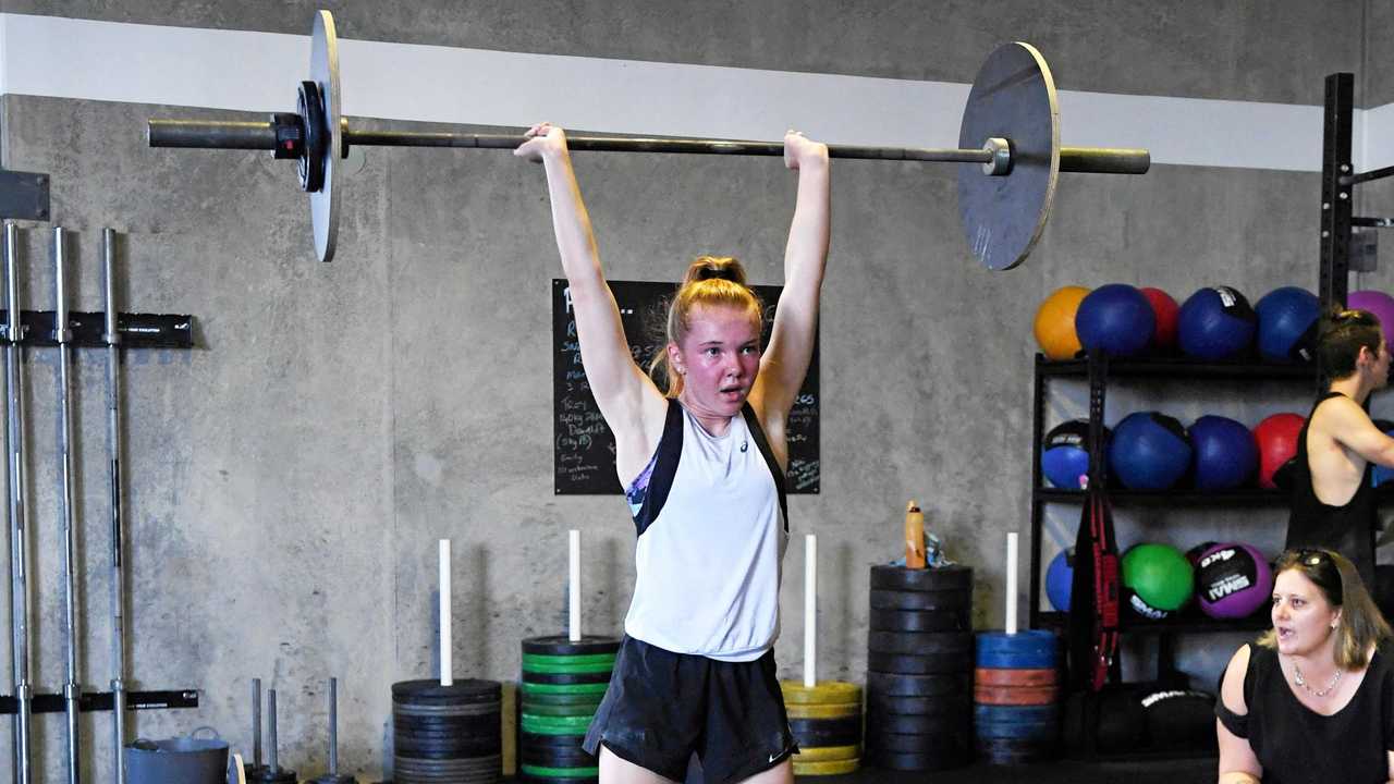 GUT-BUSTING: Gympie Crossfit athlete Charlie Morgan competes in the final open workout of the five-week global program. Picture: Troy Jegers