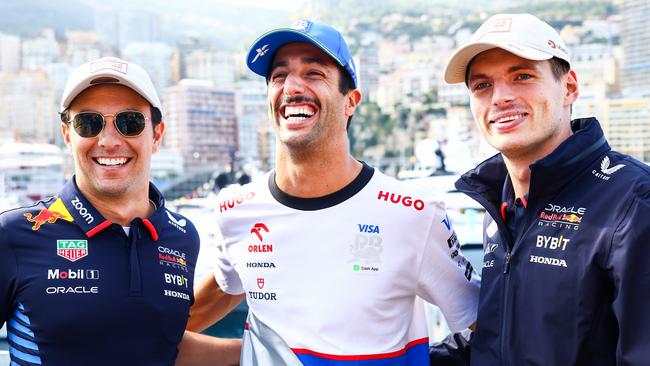 MONTE-CARLO, MONACO - MAY 23: Sergio Perez of Mexico and Oracle Red Bull Racing, Daniel Ricciardo of Australia and Visa Cash App RB and Max Verstappen of the Netherlands and Oracle Red Bull Racing pose for a photo in the Paddock during previews ahead of the F1 Grand Prix of Monaco at Circuit de Monaco on May 23, 2024 in Monte-Carlo, Monaco. (Photo by Mark Thompson/Getty Images)