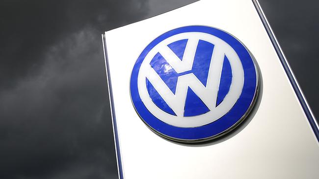 WOLFSBURG, GERMANY - SEPTEMBER 23: Rain clouds are seen over a Volkswagen symbol at the main entrance gate at Volkswagen production plant on September 23, 2015 in Wolfsburg, Germany. Volkswagen CEO Martin Winterkorn and other members of the supervisory board are believed to be meeting inside the headquarters to discuss the Volkswagen Diesel emission scandal, which affects 11 million vehicles worldwide. (Photo by Alexander Koerner/Getty Images)