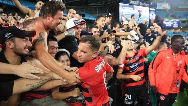 Brendon Santalab thanks Wanderers fans after the derby win over Sydney FC at ANZ Stadium. Picture: Mark Evans