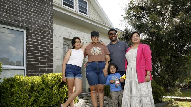 Vishal and Ritu Ranjan, with kids Kunishka, Vedika and Ayansh, outside their St Marys home. They said they were lucky to buy before prices rose again. Picture: John Appleyard