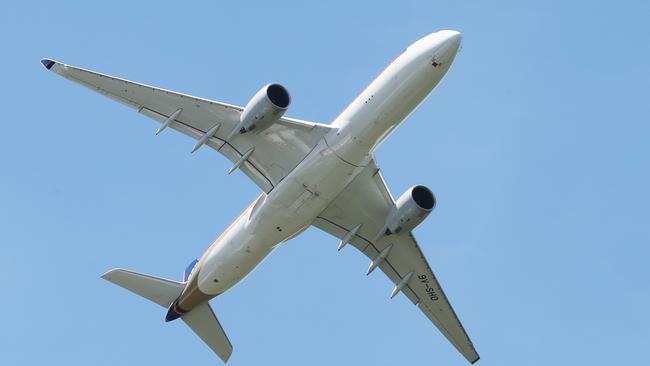 An Airbus A350 jet aeroplane operated by Singapore Airlines as a freight service takes off from Cairns Airport. Picture: Brendan Radke