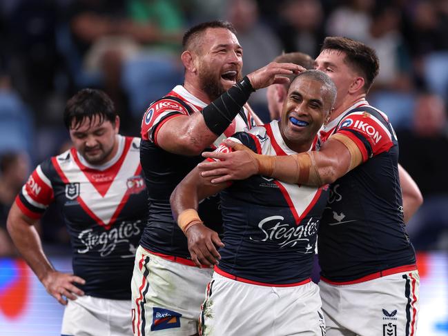 SYDNEY, AUSTRALIA – APRIL 18: Michael Jennings of the Roosters celebrates with Jared Waerea-Hargreaves and VictorÃ&#130;Â Radley of the Roosters after scoring a try during the round seven NRL match between Sydney Roosters and Melbourne Storm at Allianz Stadium on April 18, 2024, in Sydney, Australia. (Photo by Cameron Spencer/Getty Images)