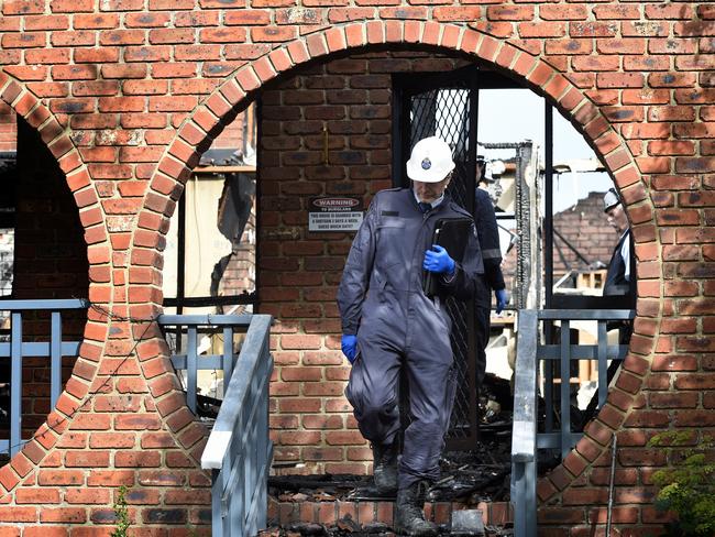 Police and fire crews at a property on Goldborough on Monday. Picture: Andrew Henshaw