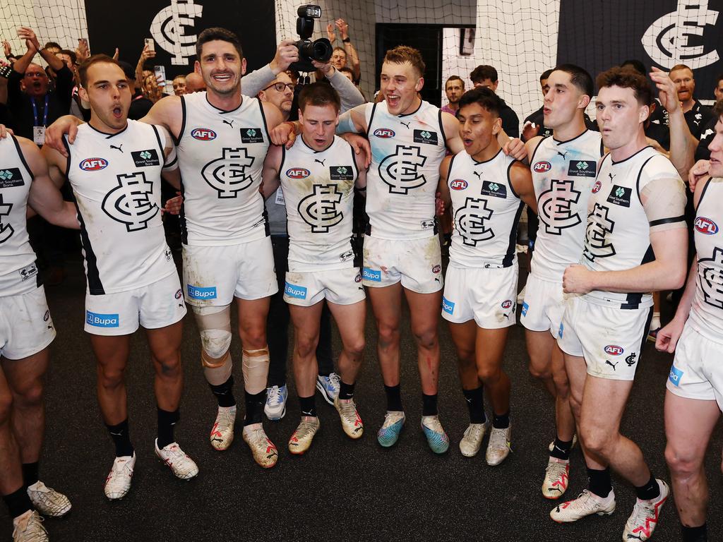 Melbourne, Australia. 02nd June, 2023. Patrick Cripps of Carlton leads  teammates from the field during the AFL Round 12 match between the  Melbourne Demons and the Carlton Blues at the Melbourne Cricket