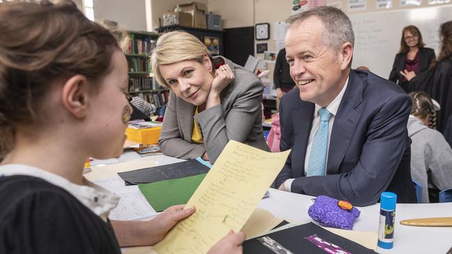 Federal Opposition Leader Bill Shorten and Deputy Leader Tanya Plibersek listen as a student performs a song at a local Brunswick primary school in Melbourne this week. Picture: Daniel Pockett/AAP