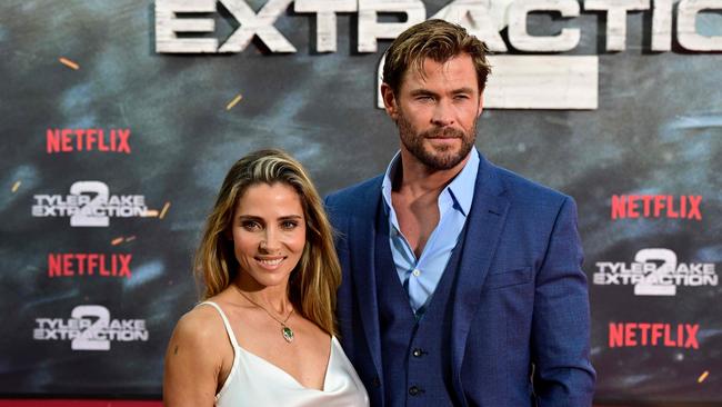 Chris Hemsworth, seen with his wife Elsa Pataky, has undergone a life transformation since learning of his potential health risks. Photo by John MACDOUGALL / AFP.