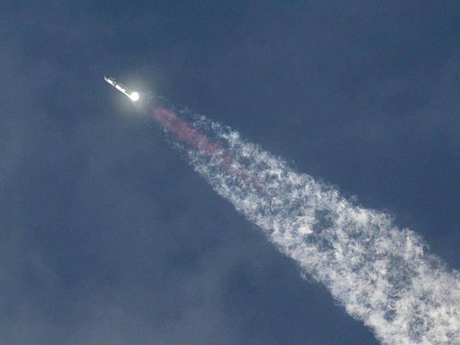 TOPSHOT - The SpaceX Starship spacecraft lifts off from Starbase in Boca Chica, Texas, on March 14, 2024. SpaceX on Thursday carried out the third test launch of Starship, the world's most powerful rocket that is vital to NASA's plans for landing astronauts on the Moon and Elon Musk's hopes of eventually colonizing Mars.. (Photo by CHANDAN KHANNA / AFP)