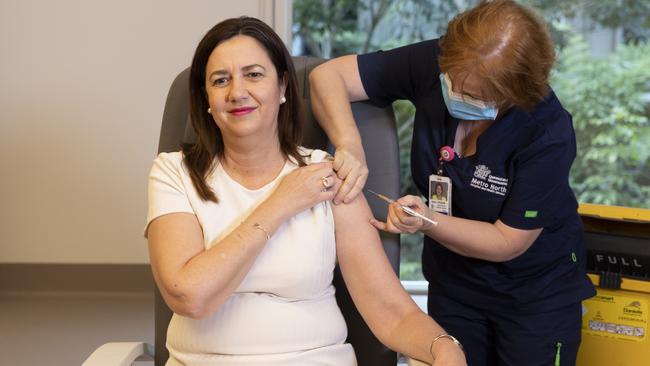 Queensland Premier Annastacia Palaszczuk is given the her COVID-19 vaccination by clinical nurse Dawn Pedder at the Surgical Treatment Rehabilitation Service Centre in Brisbane. Photo: Sarah Marshall