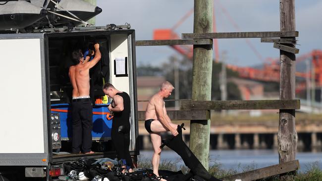 The scene at the Port of Newcastle where a drug mule drowned trying the retrieve more than 50kg of cocaine from the Hunter River on Monday. Police divers, AFP, detectives and local police were on the scene early on Tuesday morning to continue investigations. Picture by Peter Lorimer