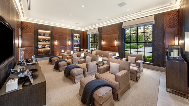 The home cinema is a lavish setting for movie nights.