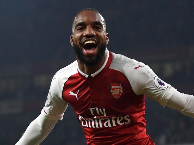 LONDON, ENGLAND - SEPTEMBER 25:  Alexandre Lacazette of Arsenal celebrates as he scores their first goal during the Premier League match between Arsenal and West Bromwich Albion at Emirates Stadium on September 25, 2017 in London, England.  (Photo by Mike Hewitt/Getty Images)