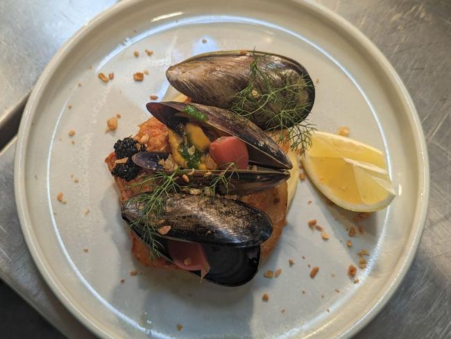 Home Hill restaurant’s market fish with Spring Bay Mussels. Picture: Supplied