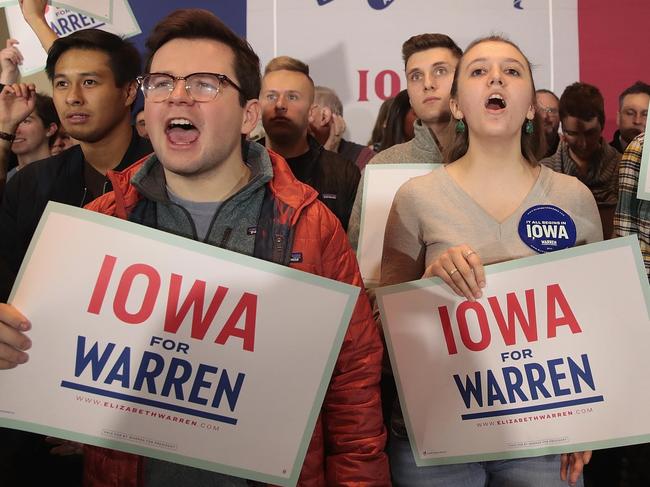 CEDAR RAPIDS, IOWA - FEBRUARY 10: Guests listen as Sen. Elizabeth Warren (D-MA) speaks at a campaign rally at the University of Iowa on February 10, 2019 in Iowa City, Iowa. Warren is making her first three campaign stops in the state since announcing yesterday the she was officially running for the 2020 Democratic nomination for president.   Scott Olson/Getty Images/AFP == FOR NEWSPAPERS, INTERNET, TELCOS & TELEVISION USE ONLY ==