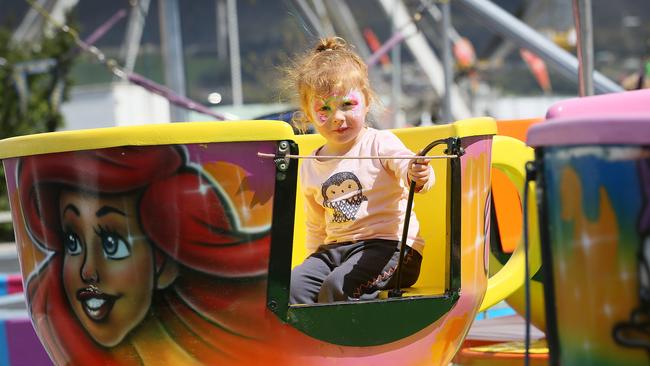Emmi Bannister, 3, of Bridgewater, enjoying a ride in a teacup.