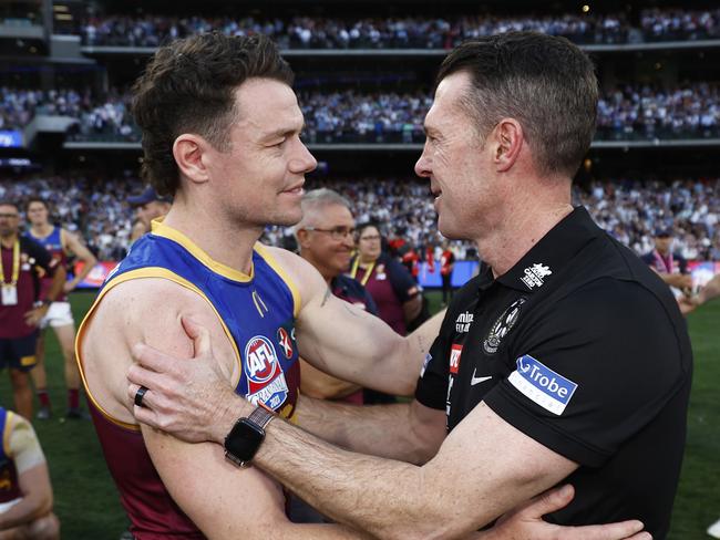 MELBOURNE, AUSTRALIA - SEPTEMBER 30: Lachie Neale of the Lions congratulates Magpies head coach Craig McRae after the 2023 AFL Grand Final match between Collingwood Magpies and Brisbane Lions at Melbourne Cricket Ground, on September 30, 2023, in Melbourne, Australia. (Photo by Daniel Pockett/AFL Photos/via Getty Images)