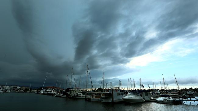 An afternoon storm forms over the Gold Coast Hinterland and Mt Tamborine area pictured from Hope Island Marina. Pic by David Clark