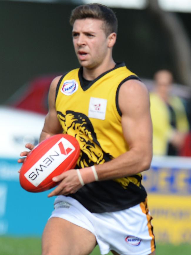 Andrew Panayi in action for Werribee Districts. Picture: Kris Reichl