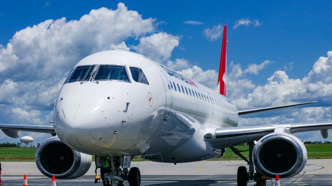 An Embraer E190 in Qantas Livery arrives in Darwin ahead of an announcement to new services in the NTPicture: Glenn Campbell