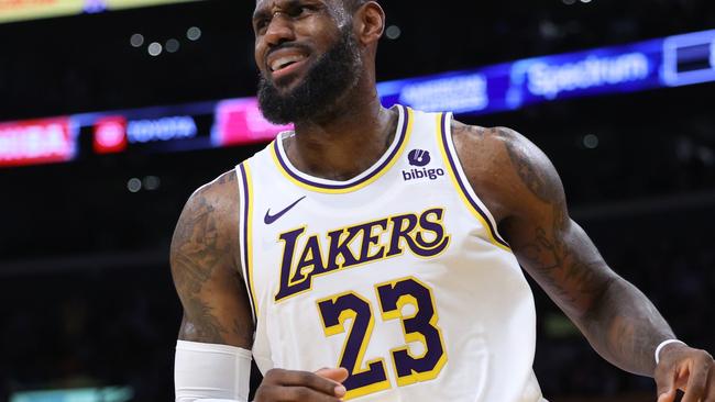 LOS ANGELES, CALIFORNIA - JANUARY 21: LeBron James #23 of the Los Angeles Lakers reacts to a Lakers score during a 134-110 win over the Portland Trail Blazers at Crypto.com Arena on January 21, 2024 in Los Angeles, California. User is consenting to the terms and conditions of the Getty Images License Agreement. (Photo by Harry How/Getty Images)