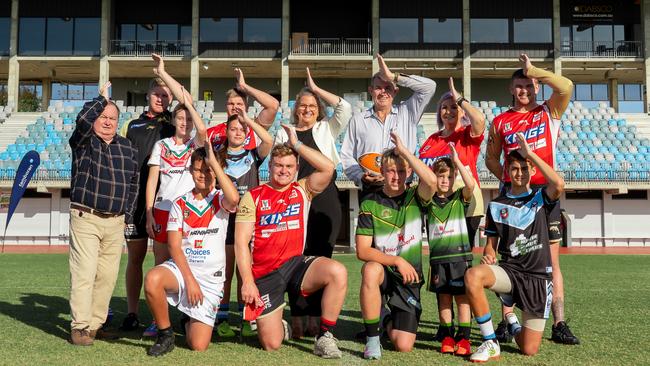 Phins up as players from the Dolphins meet with NT Deputy Chief Minister, Hon Gerard Maley, Minister for Major Events, Hon Marie-Clare Boothby and Minister for Trade, Business and Asian Relations, Hon Robyn Cahill, along with NT junior rugby league players at the Dolphins NRL partnership announcement. Picture: NT Major Events Company: Verity Griffin