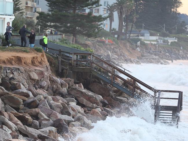 Steps down to the beach are a no-go area. Picture: John Grainger