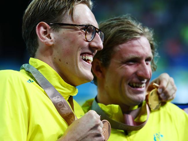 GOLD COAST, AUSTRALIA - APRIL 10:  Bronze medalist Mack Horton of Australia (L) and gold medalist Jack McLoughlin of Australia pose during the medal ceremony for the Men's 1500m Freestyle Final on day six of the Gold Coast 2018 Commonwealth Games at Optus Aquatic Centre on April 10, 2018 on the Gold Coast, Australia.  (Photo by Clive Rose/Getty Images)