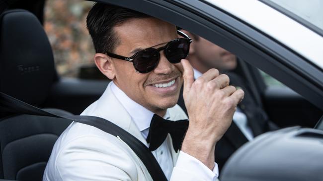 A thumbs-up from the beaming groom. Picture: Julian Andrews