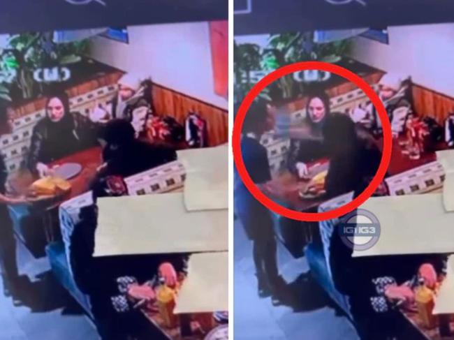 Police have arrested a man after a viral video showing a waitress being slapped with a plate.