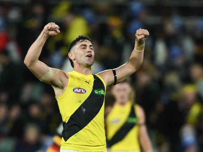 ADELAIDE, AUSTRALIA - JUNE 06: Tim Taranto of the Tigers celebrate the final siren during the round 13 AFL match between Adelaide Crows and Richmond Tigers at Adelaide Oval, on June 06, 2024, in Adelaide, Australia. (Photo by Mark Brake/Getty Images)