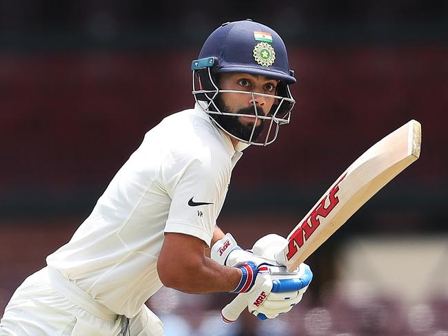 India's Virat Kohli cuts during India v CAXI tour match at the SCG. Picture. Phil Hillyard