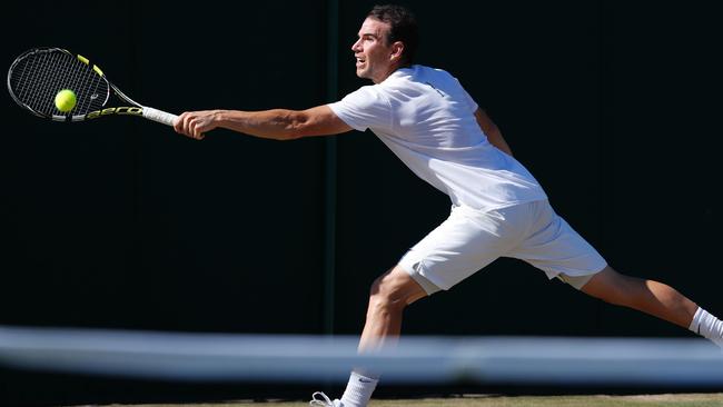 Adrian Mannarino in action against Gael Monfils. Picture: AFP Photo