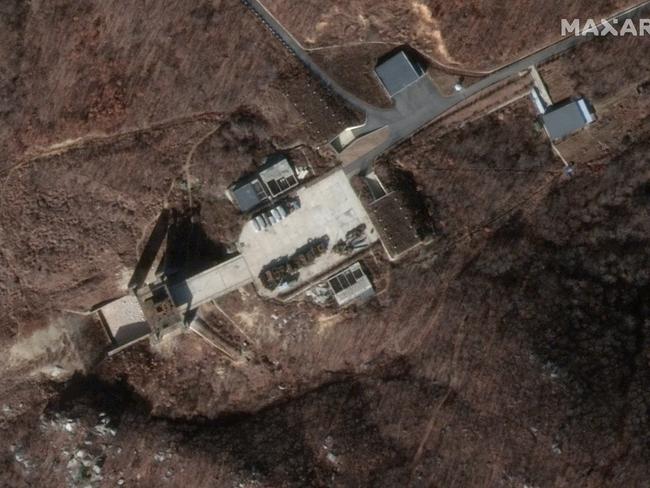 This image provided by DigitalGlobe and taken on Tuesday, March 5, 2019 shows a satellite image of North Korea's Sohae facility. Satellite imagery showing new activity at a North Korean rocket launch site has raised doubt that Kim Jong Un will ever give up his nuclear weapons. U.S.-North Korea talks are continuing and President Donald Trump is still hoping to get a deal despite the failure of the two leadersâ€™ second summit. Trump said Wednesday that heâ€™d be unhappy if reports were true that Kim was rebuilding a launch site after promising in Vietnam to extend his current ban on nuclear and rocket tests. (DigitalGlobe via AP)