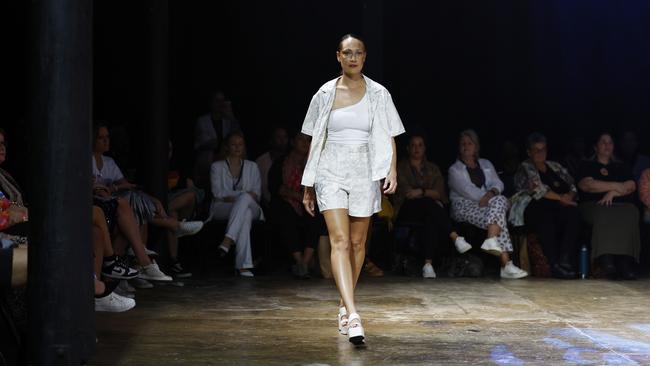 Tanika Parker models the Wali Kara collection by designer Emily Beckley at the Cairns Indigenous Art Fair fashion performance, Woven, held at the Tanks Arts Centre, Edge Hill. Picture: Brendan Radke