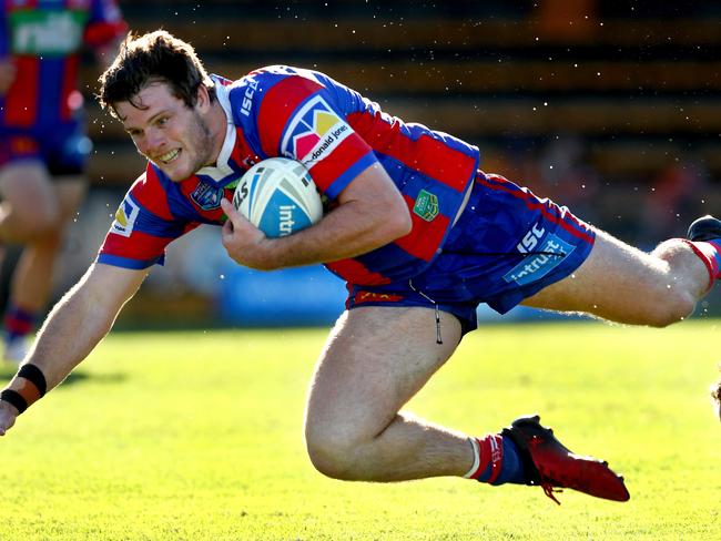 Lachlan Fitzgibbon dives over for a try during the NSW Cup game. Picture: Gregg Porteous