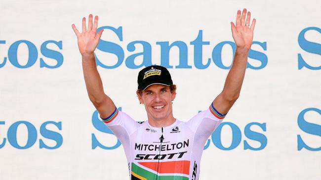 Daryl Impey of South Africa and Team Mitchelton-Scott celebrates on the podium after winning the 21st Santos Tour Down Under 2019. Picture: Daniel Kalisz/Getty Images.