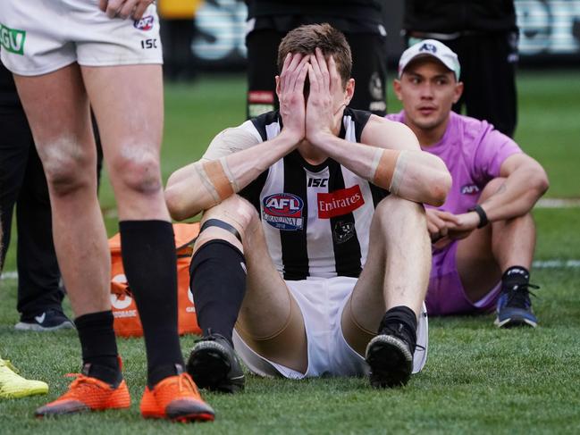 Mason Cox looks dejected. Picture: Michael Dodge