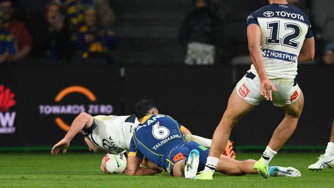 Dylan Brown produced one of the try-savers of the year, coming out of nowhere to stop Chad Townsend just metres out from the try-line. Picture: NRL Imagery.