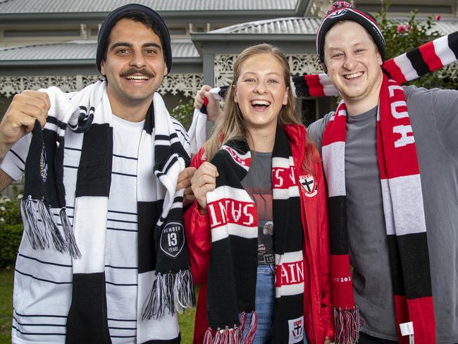 Housemates and mad footy fans, L-R Frankie Ravida Collingwood fan, Sophie Murphy and Jeremy Murphy both Saints fans are very happy their footy teams have made the Semi Finals. Picture: Sarah Matray