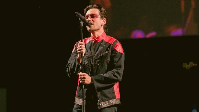 Michael Cavallaro in Bono-mode fronting Achtung Baby: The U2 Show.