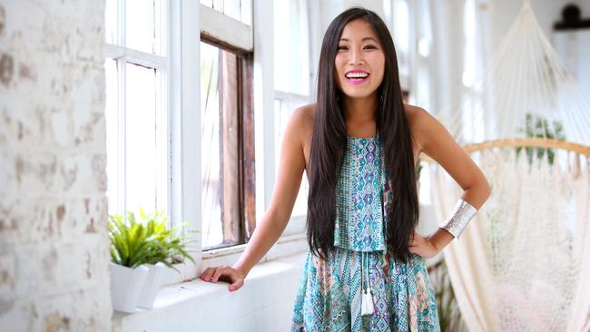 Pictured in her office in Surry Hills Sydney is Jane Lu , 28, who is the founder of the popular online fashion store ShowPo. Picture: Richard Dobson