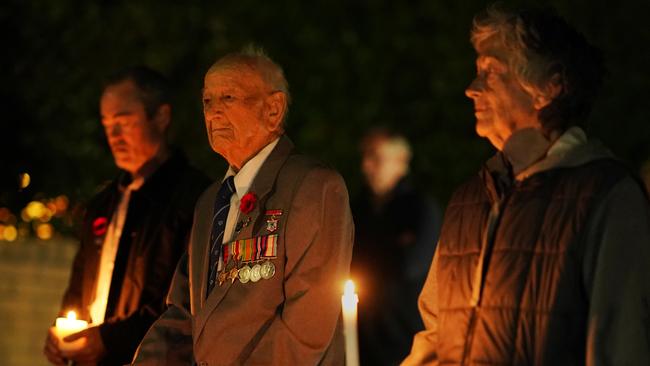 WWII veteran Jack Hair stands with grandson Dean and daughter Susan.