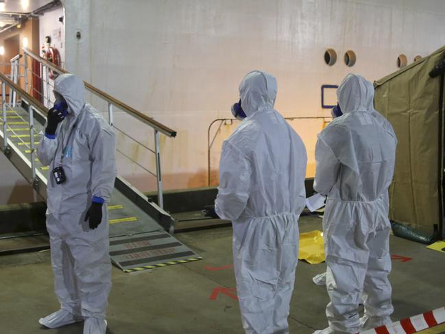 NSW police investigators prepare to board the Ruby Princess. Picture: AP