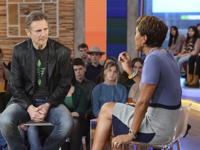 This image released by ABC shows Irish actor Liam Neeson, left, with co-host Robin Roberts on "Good Morning America," Tuesday, Feb. 5, 2019, in New York. The 66-year-old actor appeared on the morning program one day after he told an interviewer that he had violent thoughts about killing a black person after learning nearly 40 years ago that someone close to him had been raped. Neeson says he's not a racist. The actor, who was promoting the revenge film "Cold Pursuit," says we need to talk about these things because bigotry and racism exist. (Lorenzo Bevilaqua/ABC via AP)