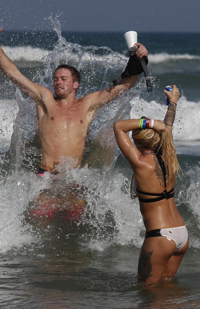 People celebrate on the beach at Clayton's Beach Bar and Grill in South Padre Island. Picture: EPA/Larry W. Smith