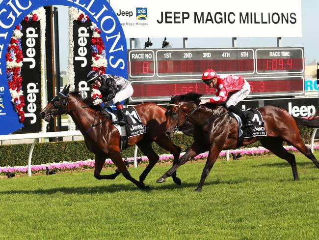 Houtzen crosses the line in the main race. Magic Millions Race Day and Fashions on the Field. Pics Tim Marsden